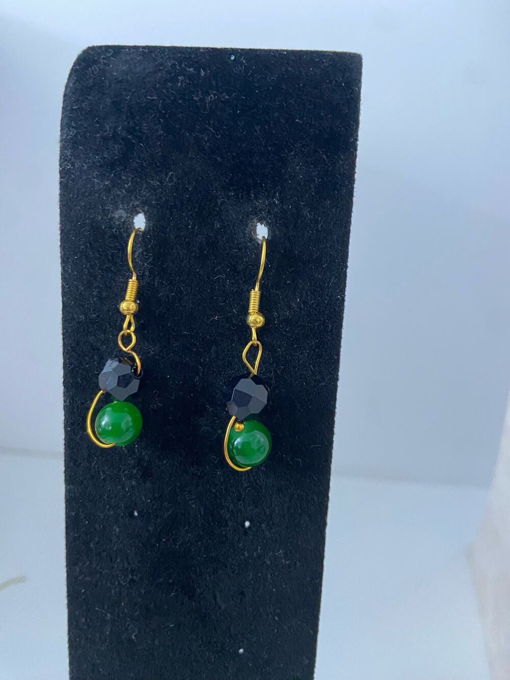 Black and green bead earrings